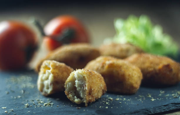 istock ham croquettes and cooked with vegetables in the background 973975152