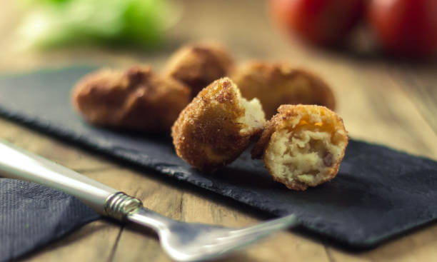istock ham croquettes and cooked with vegetables in the background 973975362