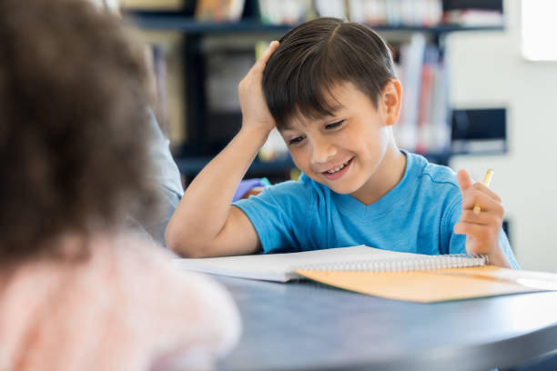 istock Little boy enjoys preschool class 973983288