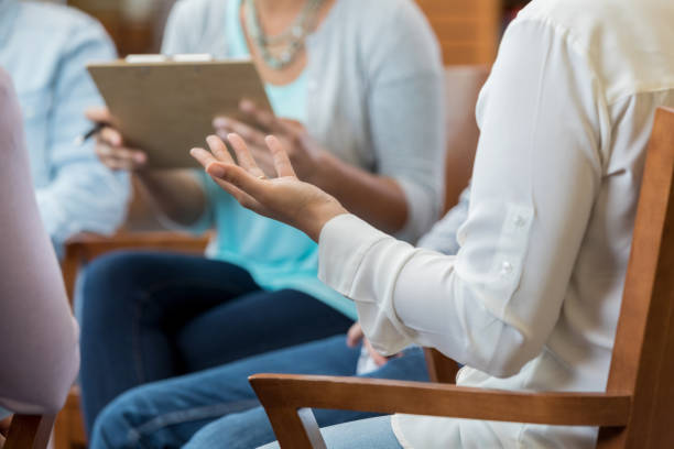 istock Upset woman gesturing during therapy session 973984358