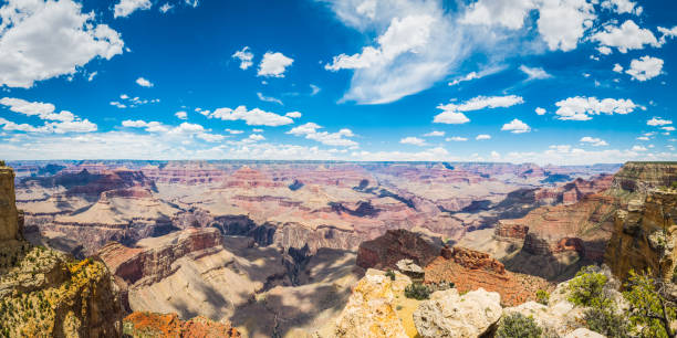 istock Grand Canyon panoramic view South Rim little fluffy clouds Arizona 974009356