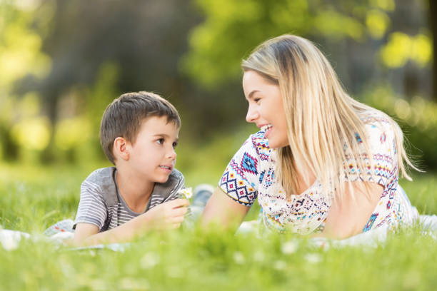 istock Mother and son in park 974011922