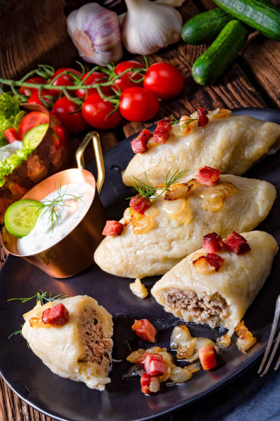 istock Rustic Cepelinai, a specialty Lithuanian and Polish cuisine. 974014892