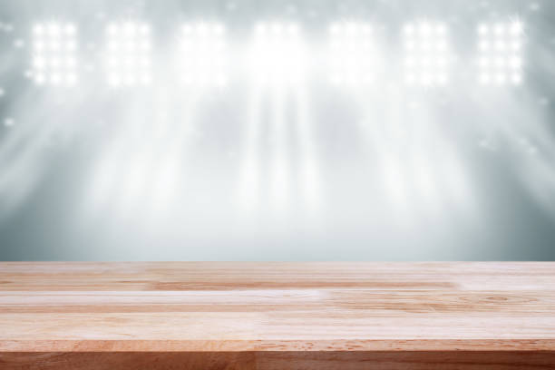istock empty wooden top table on backdrop gray gradient wall with spotlight. can use for display your product. 974060608