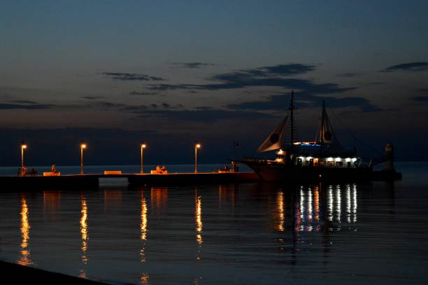 istock sunset on the sea shore 974063658