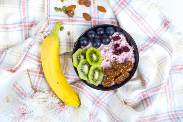 istock Mix Fruits and Nuts Healthy Concept on White 974087046
