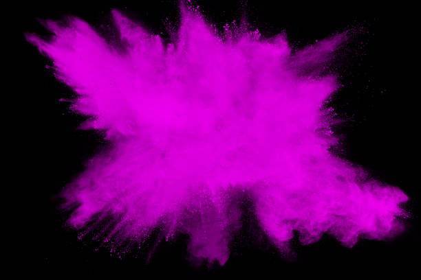 istock abstract pink dust explosion on  black background. abstract pink powder splattered on black background, Freeze motion of pink powder splash. 974137870