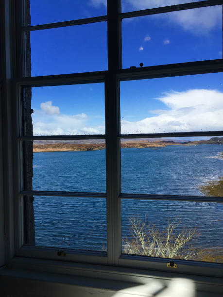 istock Beautiful Scottish Landscape Shot Thru Window 974140194