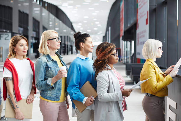 istock Business guests standing in line 974153024