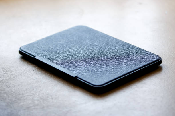 istock An Isolated Kindle on a Wooden Table 974158772