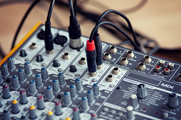 istock Audio studio sound mixing equalizer equipment board with wires 974180228