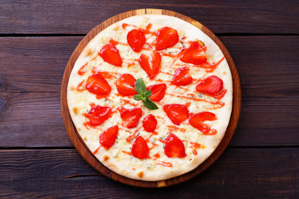 istock Fruit pizza, delicious strawberry pastry 974181368