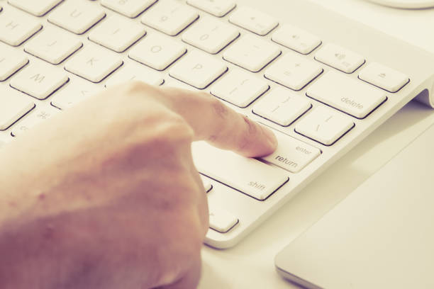 istock A Finger Tap a Keyboard Key 974187476