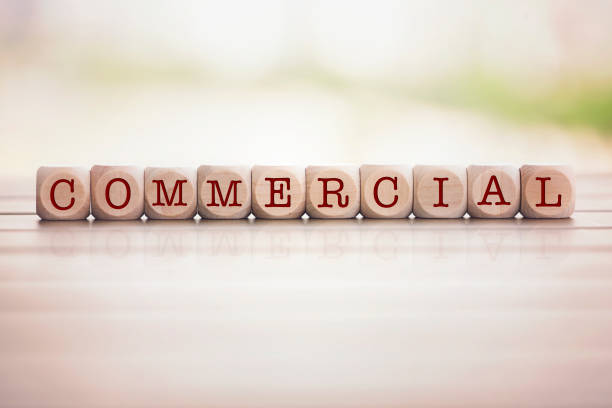 istock Commercial word written on cube wooden blocks. 974190262