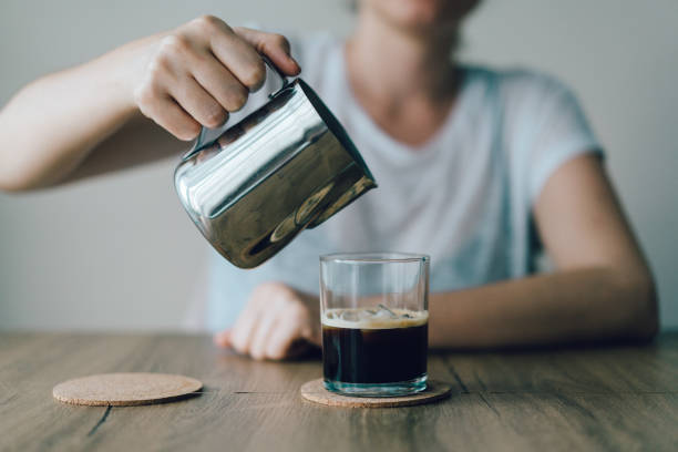 istock Iced Coffee with cream being poured in 974191074