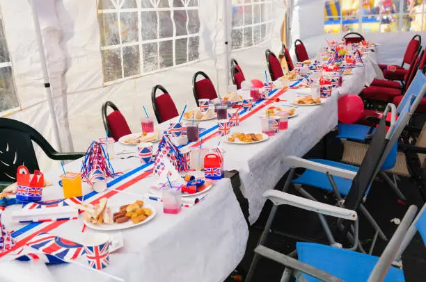 Table is laid out for a traditional British street party to celebrate a Royal Event