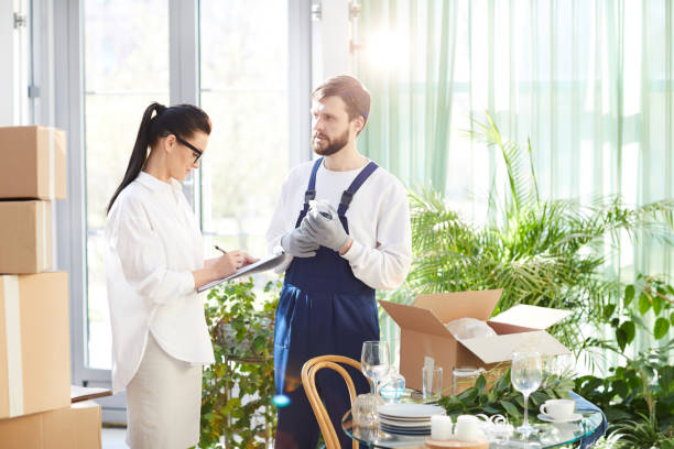 istock Female entrepreneur preparing restaurant for opening 974198230