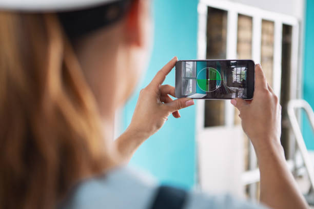 istock Inspired builder taking pictures of her project 974201946