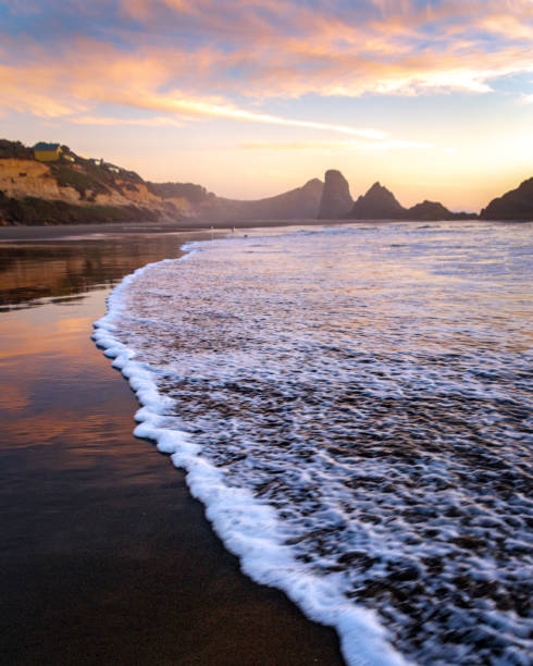 Sea stacks in the Pacific Ocean during sunset. Oregon Coast, Seal Rock Beach