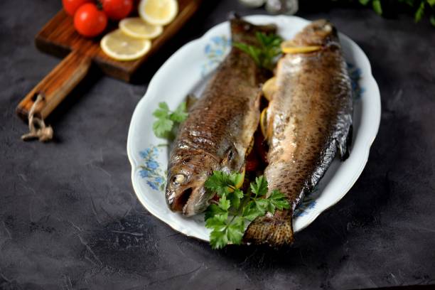 istock Baked trout with parsley 974205204