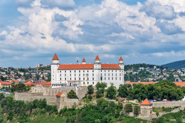 Bratislava castle Bratislava, Slovakia - May 24, 2018: View of Bratislava castle which occupies a prominent location in the city overlooking the Danube river. bratislava castle bratislava castle fort stock pictures, royalty-free photos & images