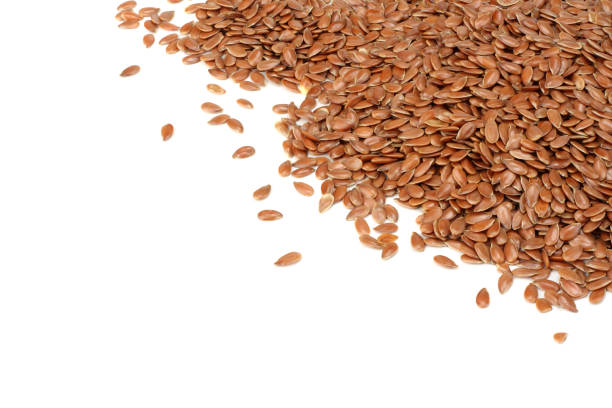 istock flax seeds isolated on white background. flaxseed or linseed. Cereals. top view 974248066