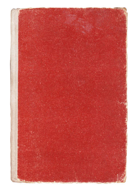 istock Very old red book cover isolated on white. 974265986