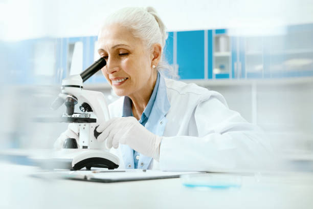 istock Clinical Test. Female Scientist Working In Laboratory. 974269432