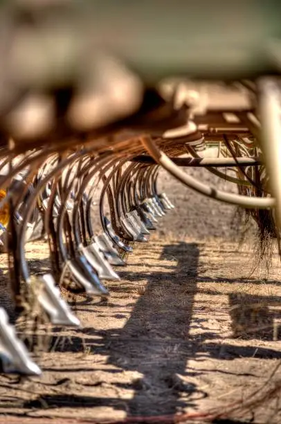 Photo of Farm implement tilling a field