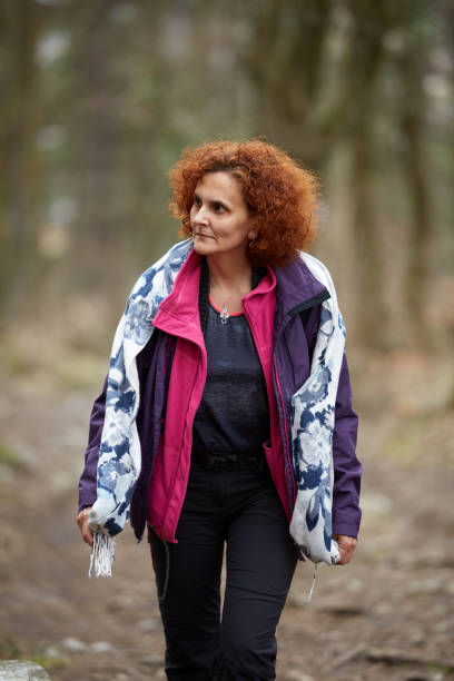 istock Woman hiking on a trail 974273606