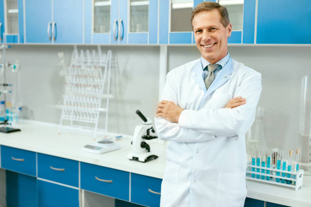 istock Male Scientist In Laboratory Portrait 974274128