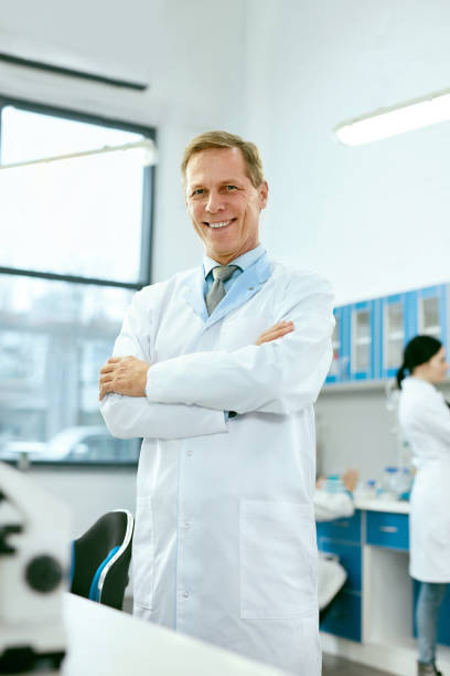 istock Male Scientist In Laboratory Portrait 974274444