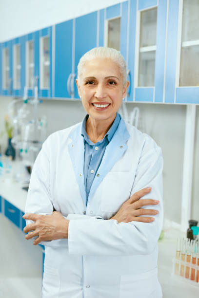 istock Scientist In Laboratory. Female Medical Worker At Workplace 974276610
