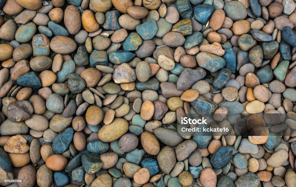 Sea pebbles. Small stones gravel texture background.Pile of pebbles Sea pebbles. Small stones gravel texture background.Pile of pebbles, thailand.Color stone in background. Beach Stock Photo