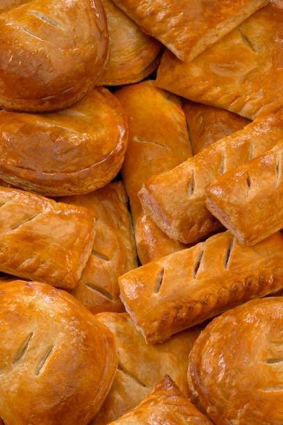 istock SELECTION OF SAVOURY PASTIES AND SAUSAGE ROLLS 974283048
