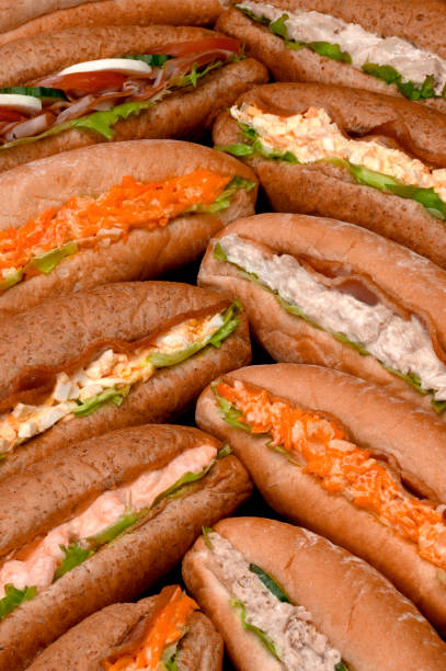 istock SELECTION OF SALAD SANDWICHES IN BREAD ROLLS 974283264