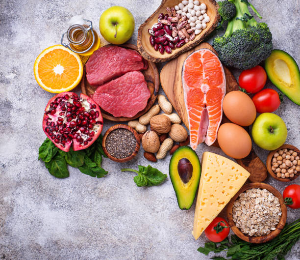 istock Meat, fish, legumes, nuts and vegetables. 974310370