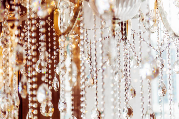 istock Crystal chandelier close-up. Glamour background with copy space 974363788