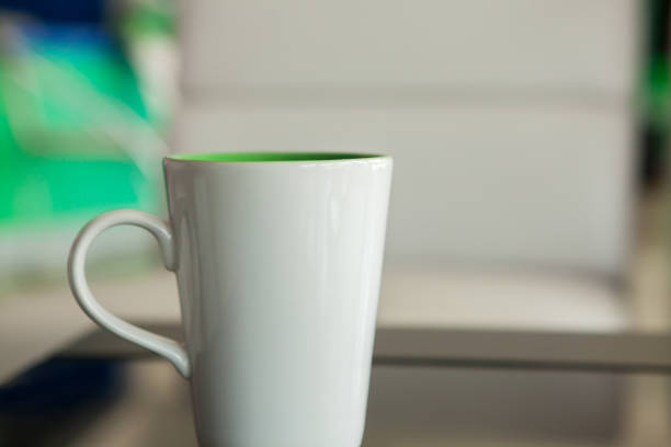 istock Coffee cup in coffee shop 974475456
