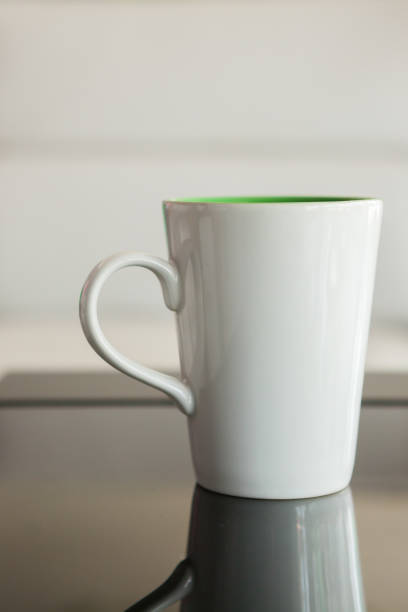 istock Coffee cup in coffee shop 974475684