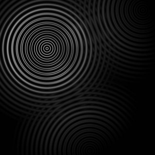 istock Abstract circle sound waves oscillating dark gray background 974507062