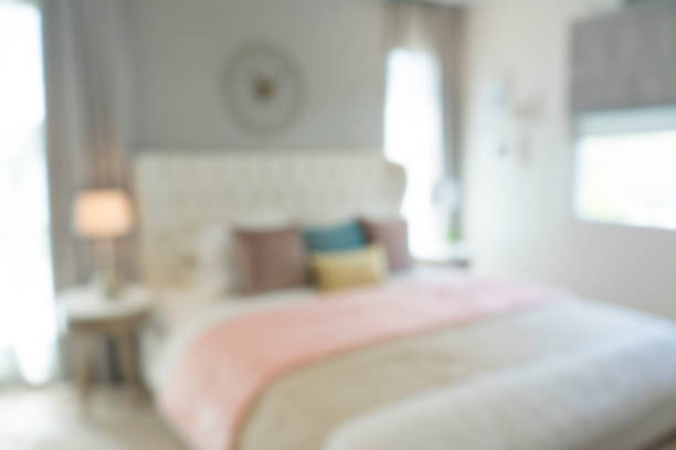 istock blurred bedroom with pillows and doll 974522710