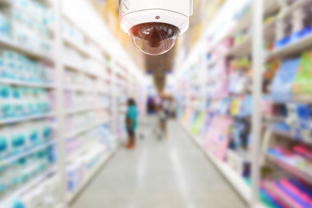 istock CCTV Security camera shopping department store on background. 974534796
