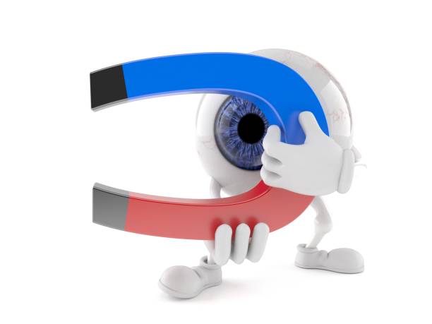 Eye ball character holding horseshoe magnet
