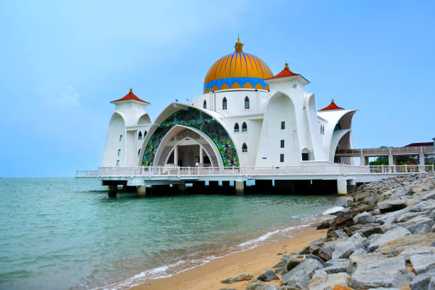 istock Malacca Straits Mosque with blue sky 974575584
