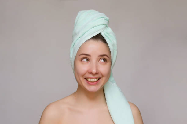 istock Woman face skin care treatment. 974584708