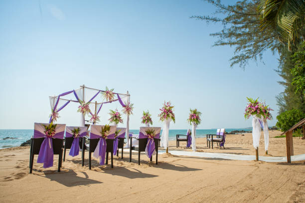 istock wedding flowers setting on the beach 974595968