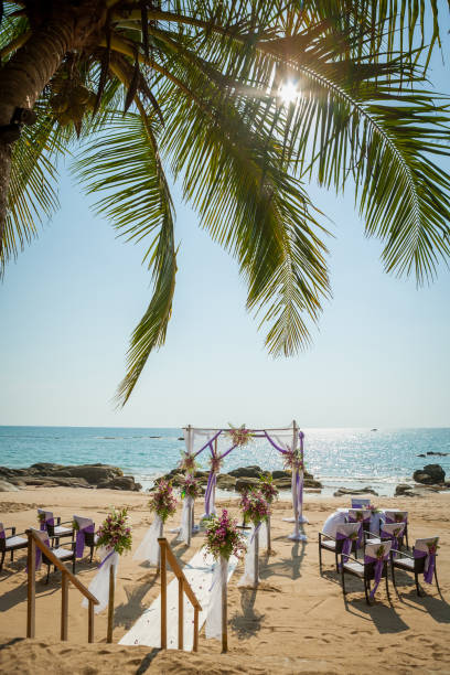 istock wedding flowers setting on the beach 974596970