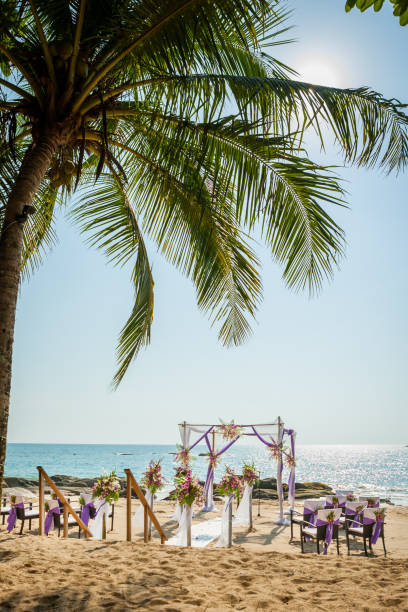 istock wedding flowers setting on the beach 974597676