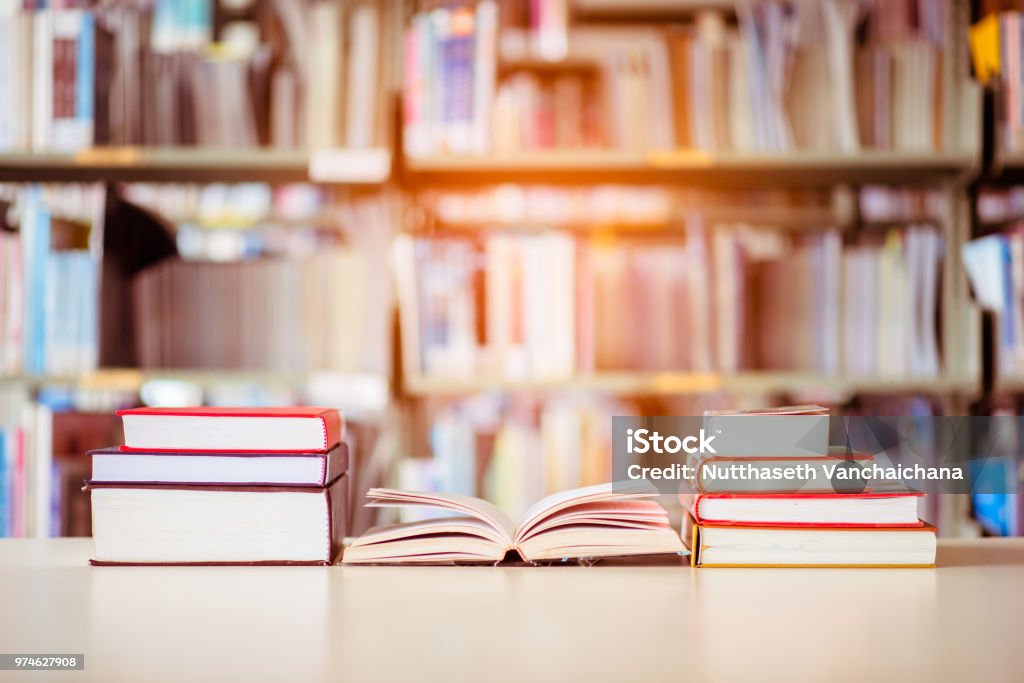 Book stack is placed on the library desk. education background, back to school concept. Book Stock Photo